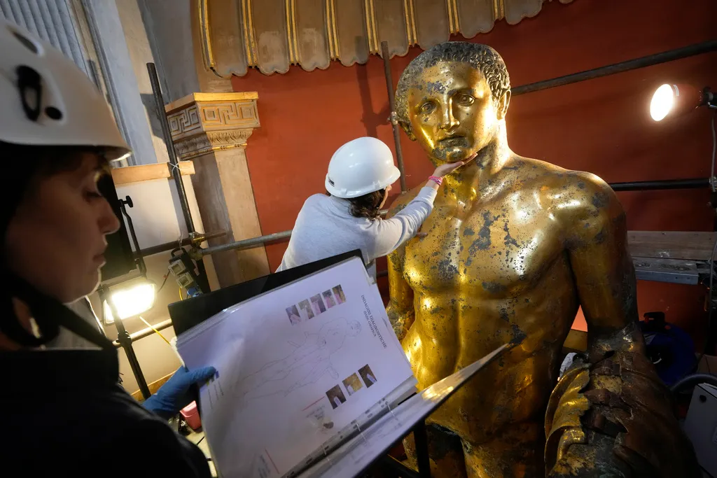 Vatican experts uncovering gilded glory of Hercules statue struck by lightning - DAILY NEWS