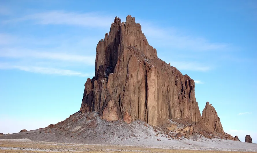 Shiprock is a striking volcanic rock formation that rises 1,583 feet above the desert floor in northwestern New Mexico.